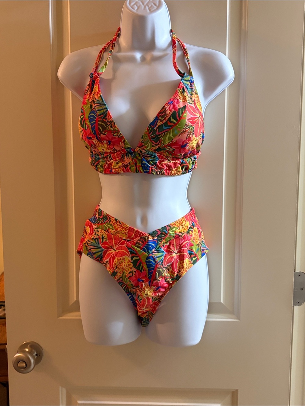 Two piece multi- color bathing suit.  New Without Tags